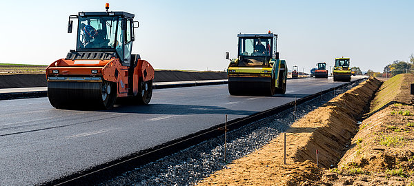 496119890 Truck, Construction Machinery, Heavy, Highway, Asphalt Paving Machine, Steamroller, Road Construction, Tar, Compactor, Rolled Up, Asphalt, Lying Down, Repairing, Working, Loading, Wheel, Tire, Physical Pressure, Beginnings, Yellow, Black Color, New, Industry, Construction Industry, Transportation, Activity, Occupation, Gravel, Steam, Street, Tractor, Conveyor Belt, Equipment, Land Vehicle, asphalting, bitumen, blacktopping, Paver Brick, pneumatic, tracked, Machinery